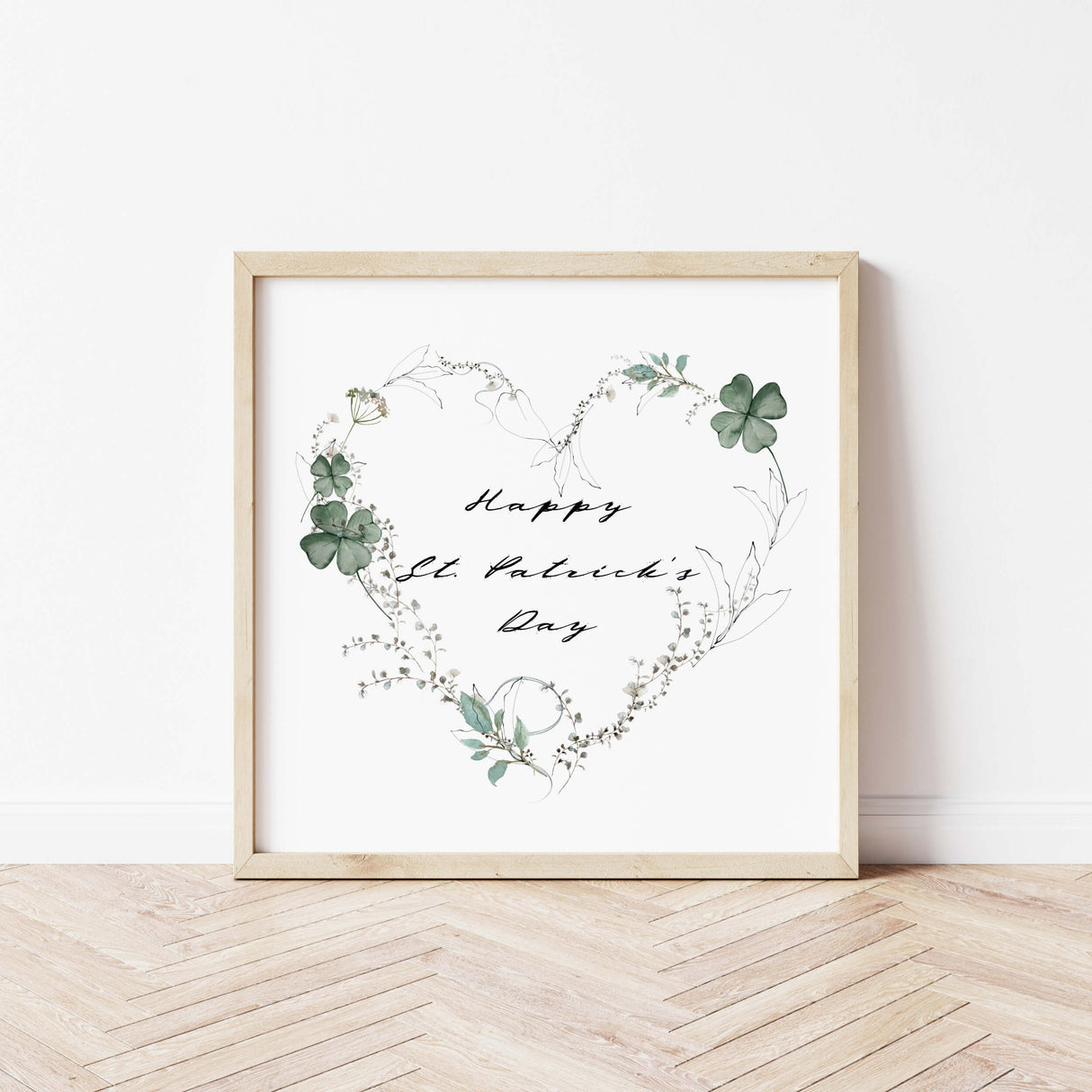 Happy St. Patrick's Day print with sage green clover and botanical heart wreath for St. Patrick home decor.