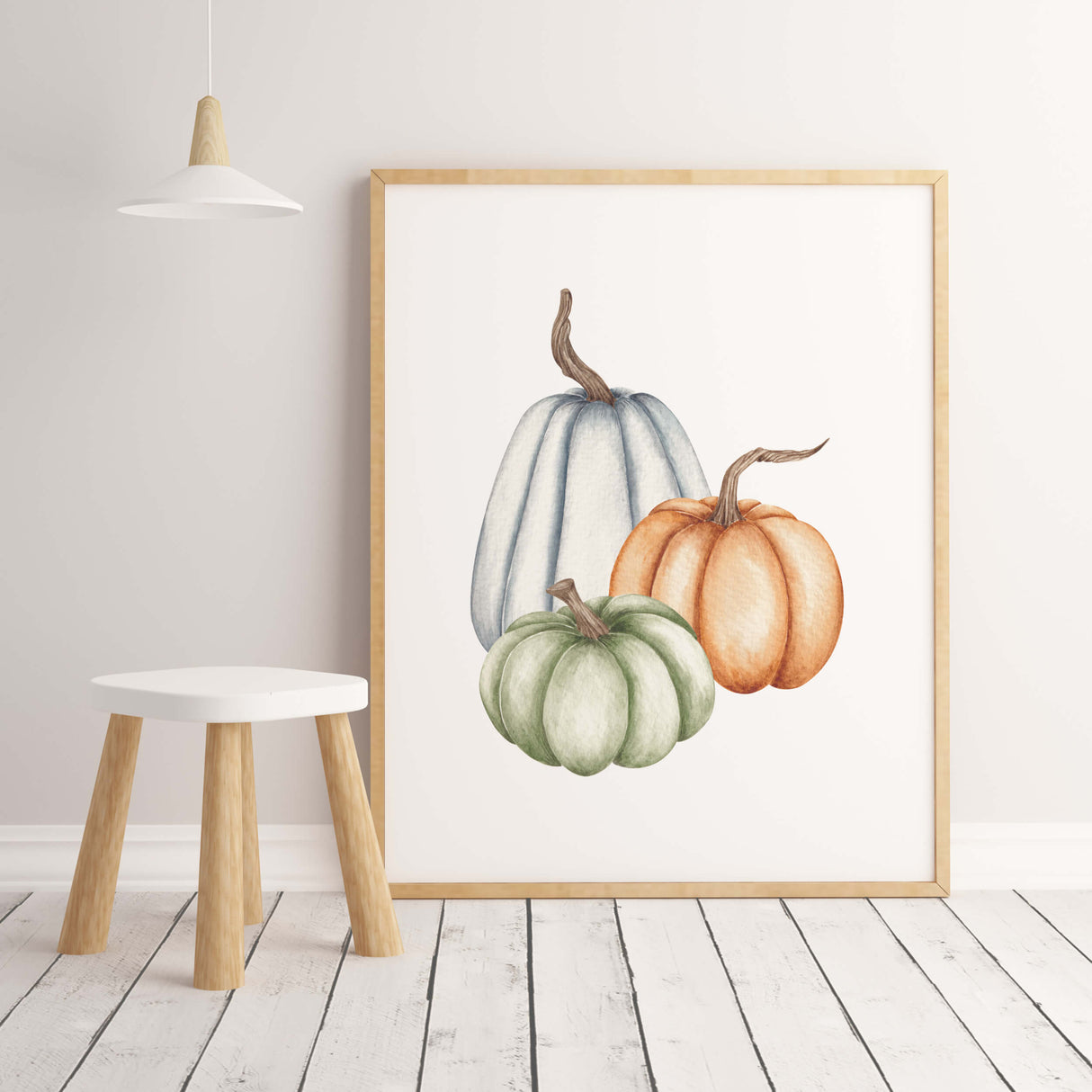 Watercolor pumpkin printable in blue, green, orange colors for boho autumn decor.