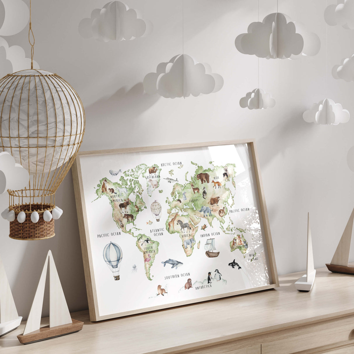 Green and brown kids educational world map with continent and animals for neutral nursery and kids decor.