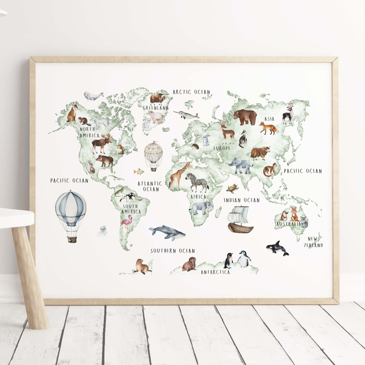 Watercolor world map with continent and animals for neutral nursery and kids room decor.
