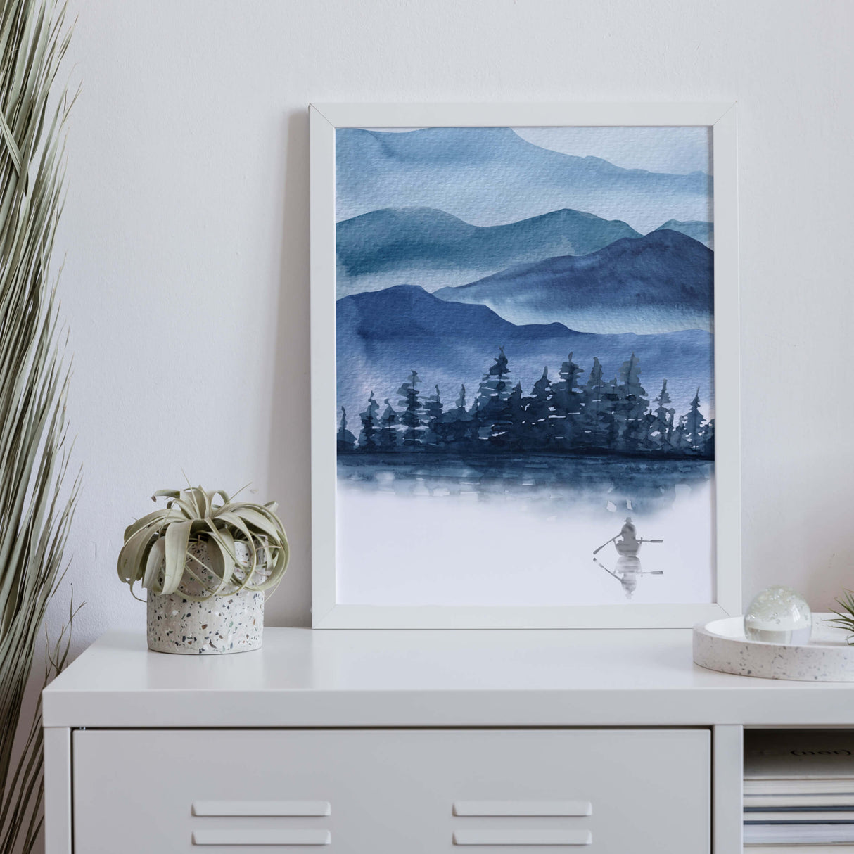 Watercolor blue mountains landscape print with a boating man and pine for neutral home decor, white home decor, boho home decor.