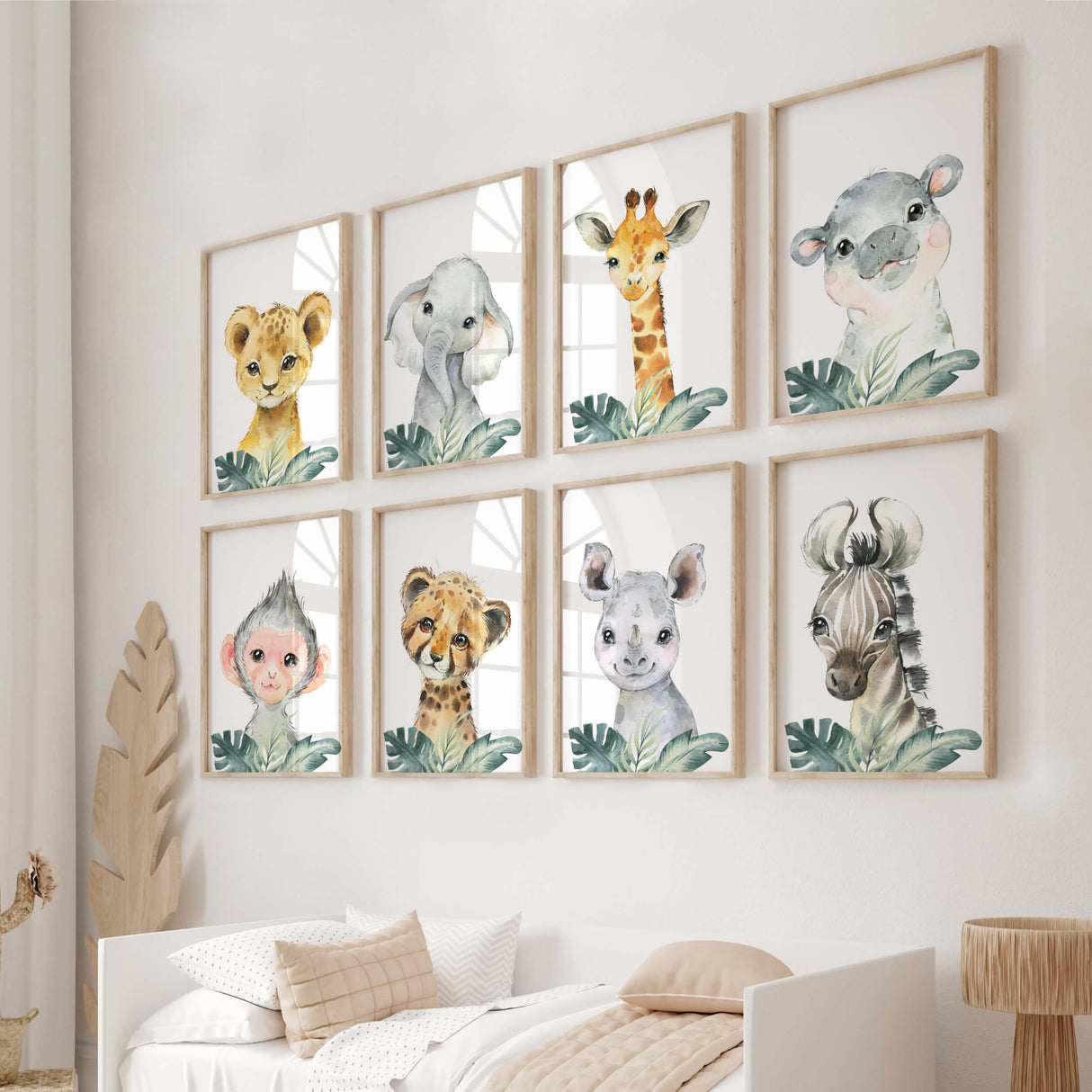 Watercolor safari animals printable with leaves for gender neutral nursery decor, baby boys room decor, girls room decor, boho room decor, animals: lion, elephant, giraffe, hippo, rhino, monkey, leopard, zebra.