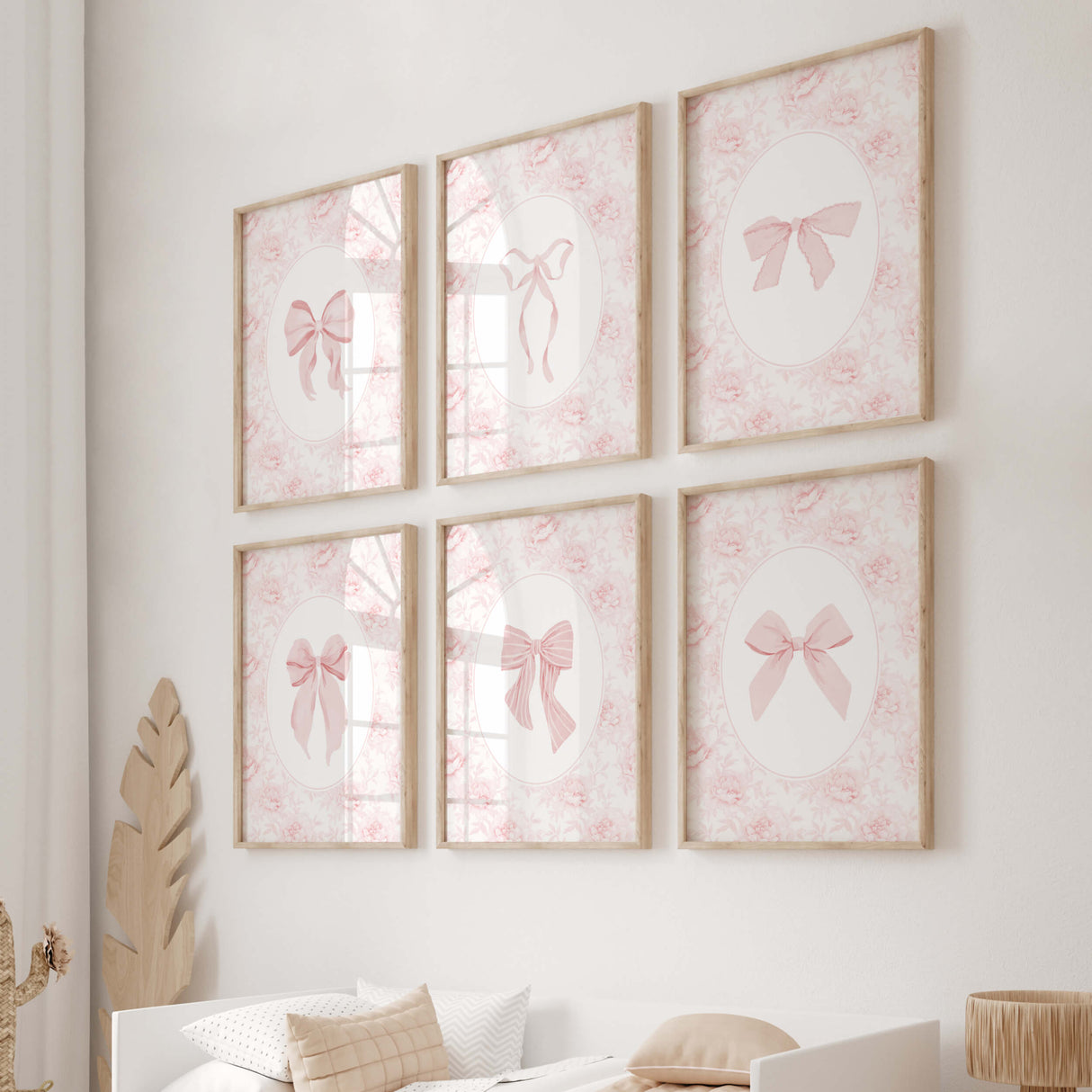 Vintage floral pink ribbon print hanging in nursery with soft pastel aesthetic
