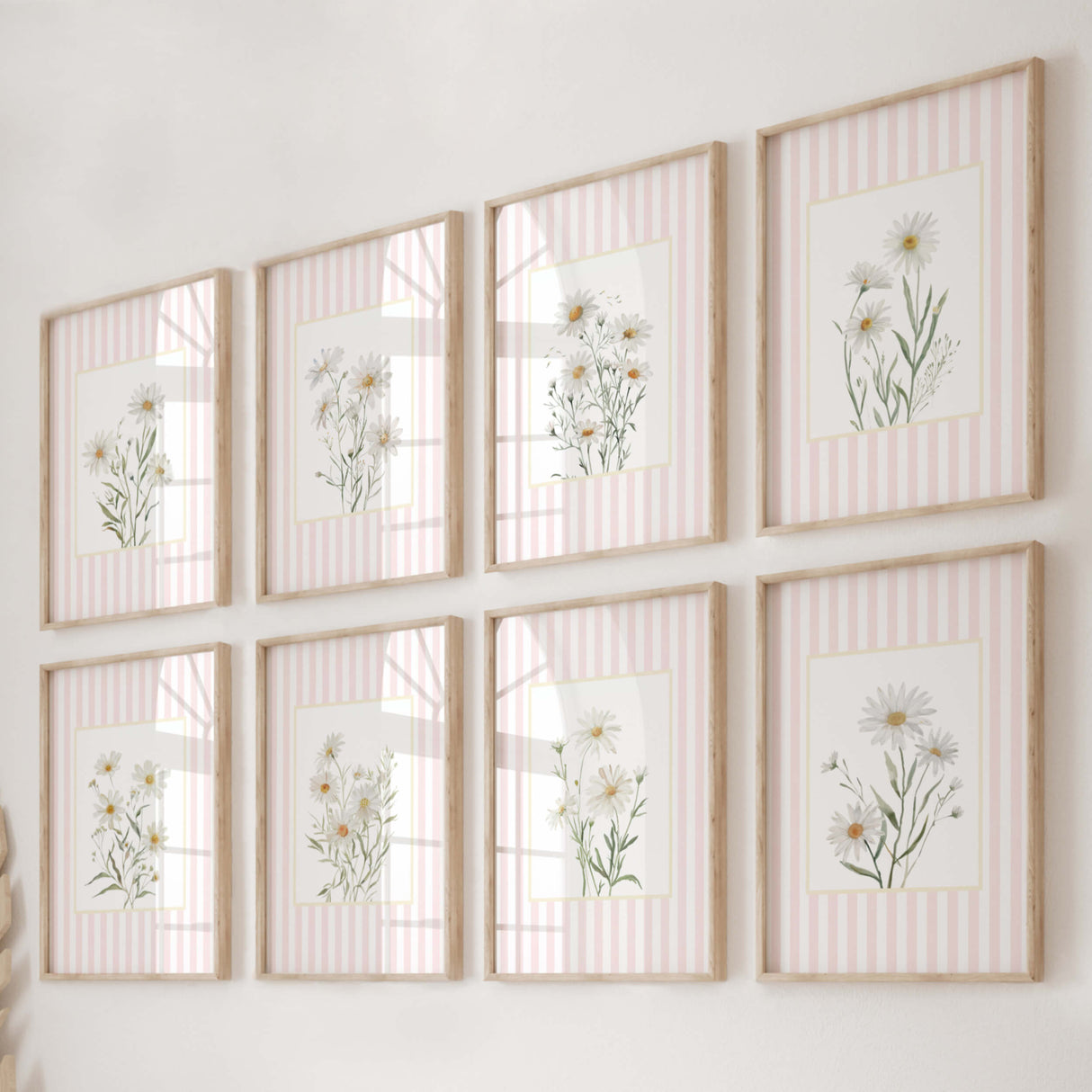 Printable daisy wall art set with pink stripes for nursery decor.