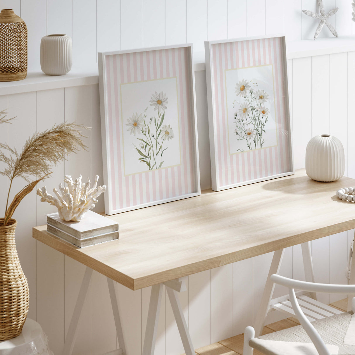 Minimalist floral prints with daisies on striped pink background.