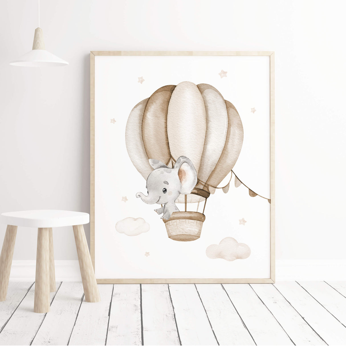 Beige nursery decor with elephant and hot air balloon print for neutral nursery decor and boho nursery decor.