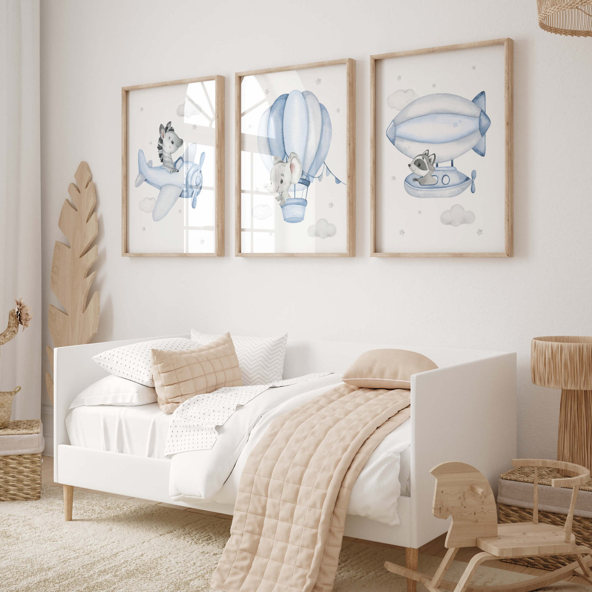 Set of 3 flying animals with zebra, elephant, raccoon, hot air balloon, airplane, airship print for toddler and boys room decor in light blue gray colors.