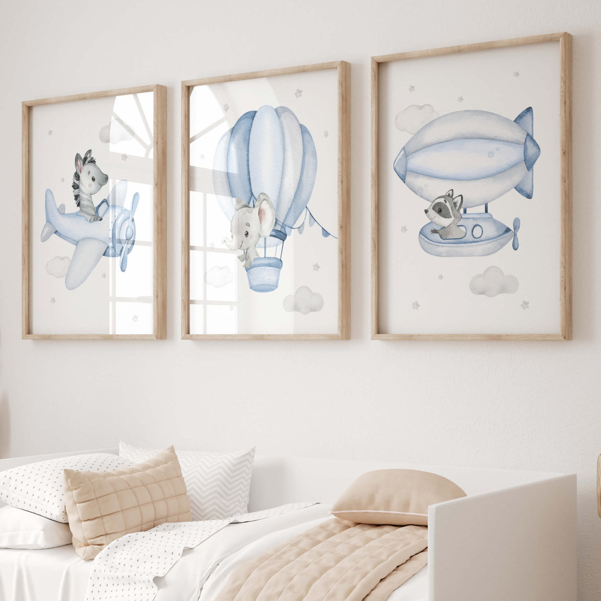 Set of 3 flying animals with zebra, elephant, raccoon, hot air balloon, airplane, airship print for toddler and boys room decor in light blue gray colors.
