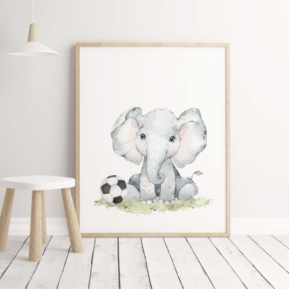 Watercolor elephant with football print for nursery decor.