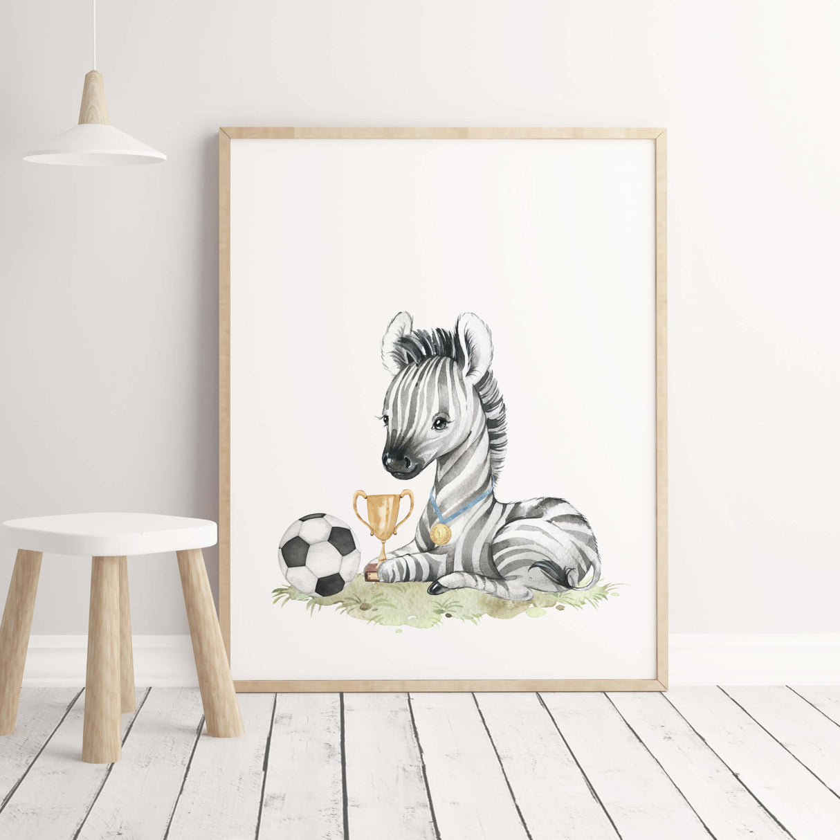 Watercolor zebra with football printable for nursery and boys room decor.