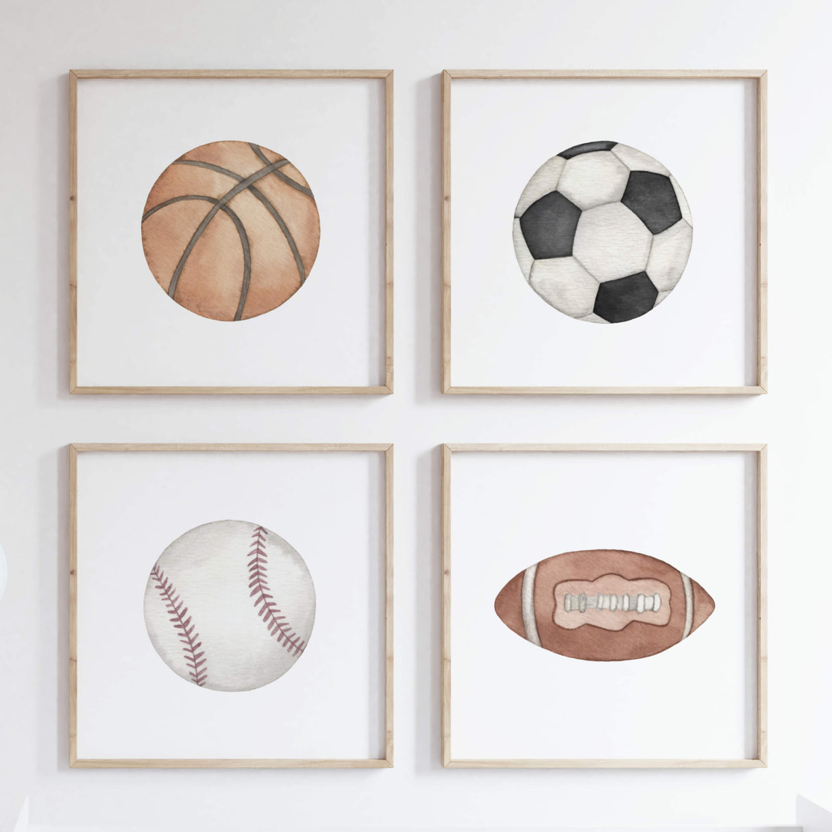 Watercolor sports ball print with football, soccer ball, basketball and baseball for neutral nursery decor, toddler room decor, boys room decor and kids room decor.