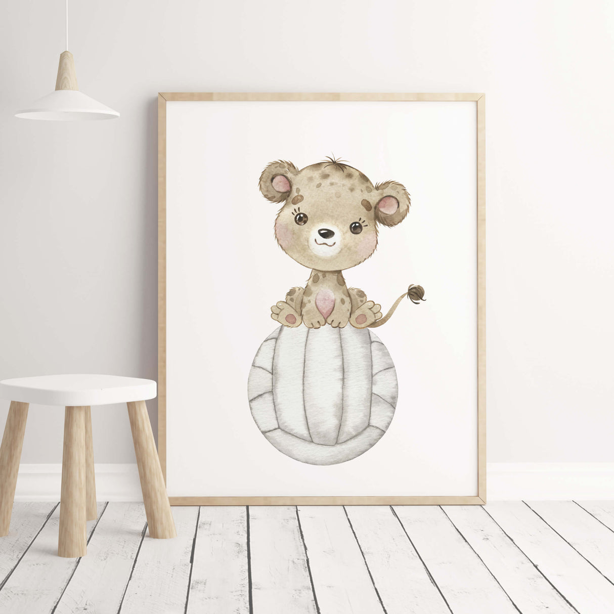 Watercolor baby lion with volleyball print for kids room and nursery decor.