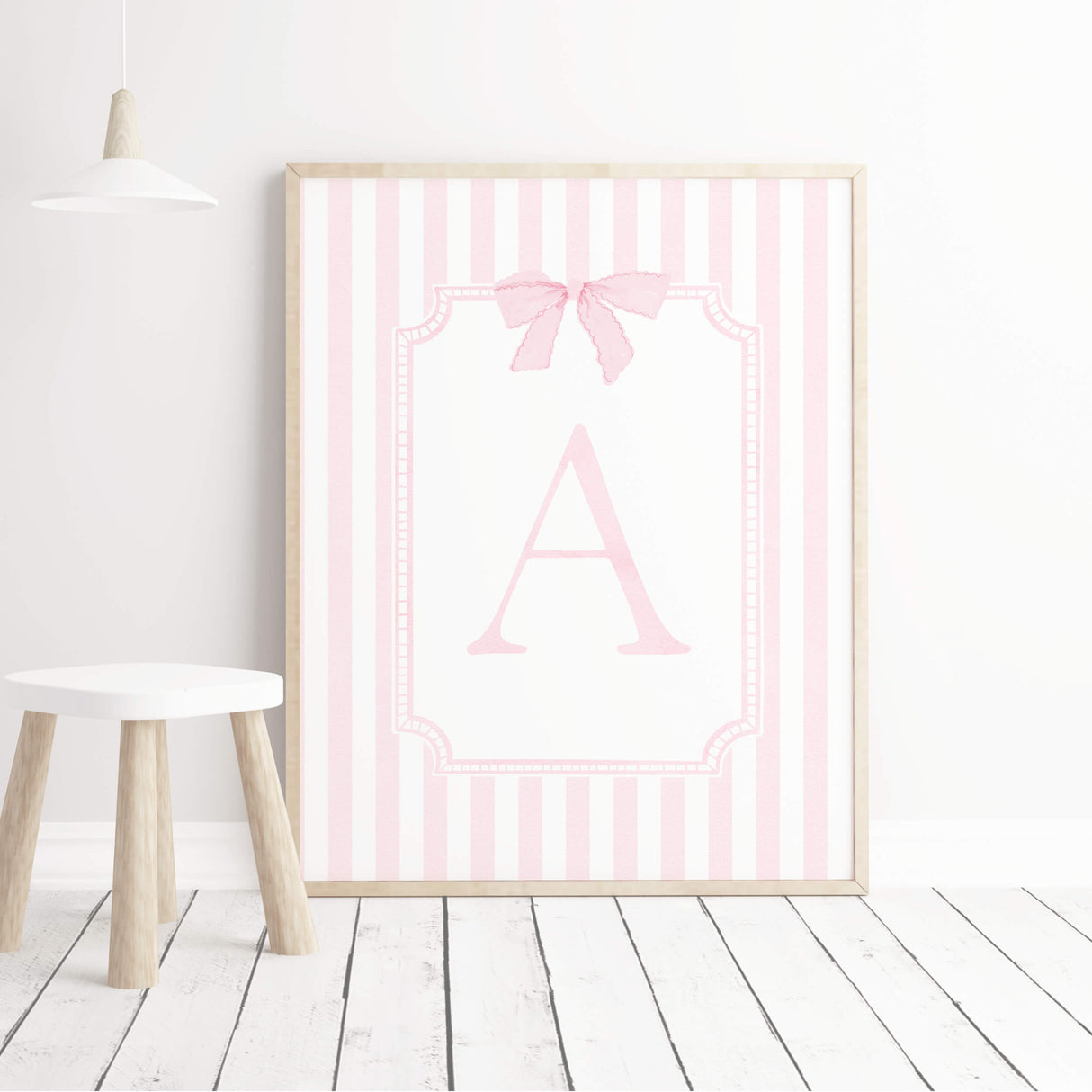 Soft pink striped nursery prints with flowers bows and initial letter wall art