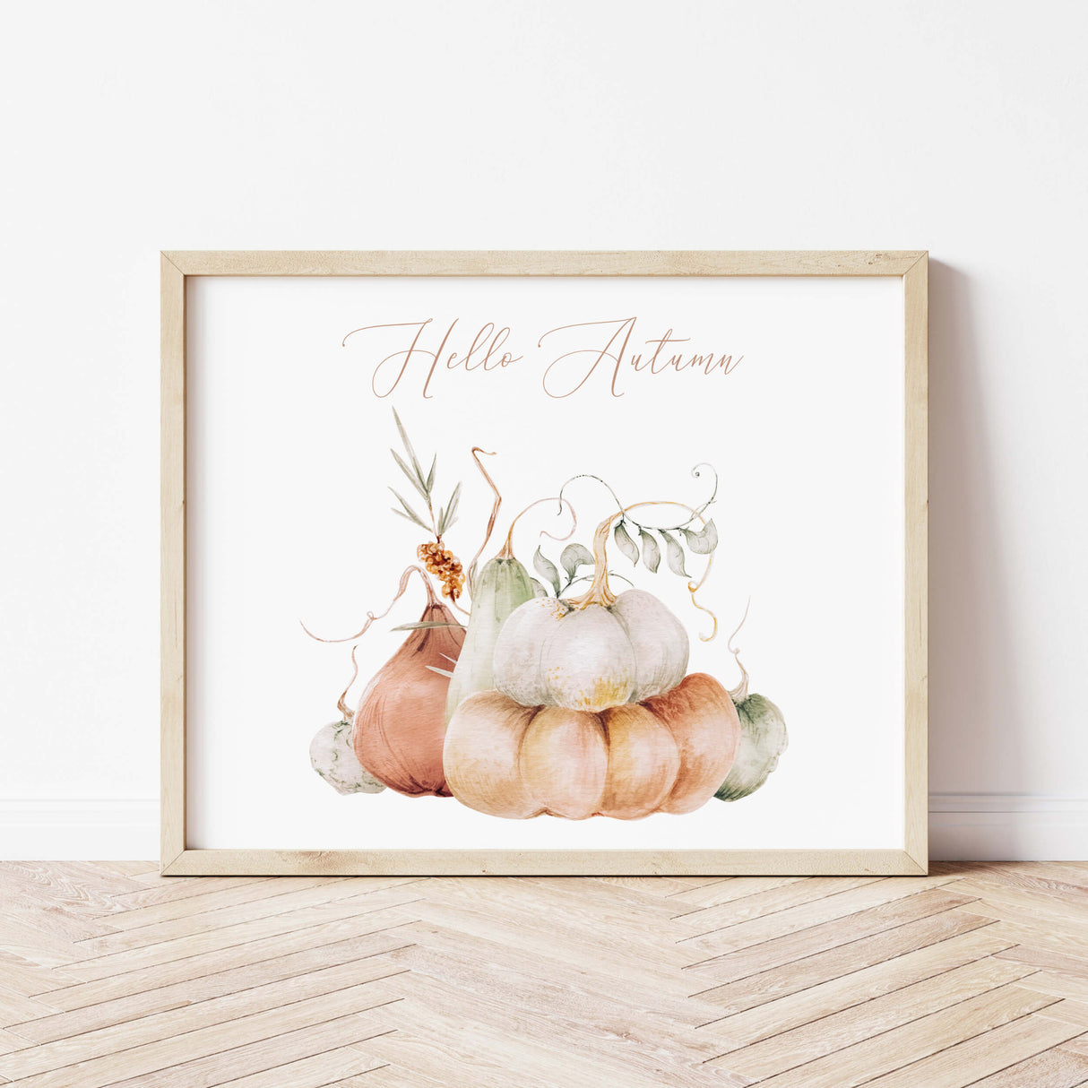 Watercolor pumpkin printable with hello autumn quote and white, green, orange pumpkin for neutral autumn home decor.