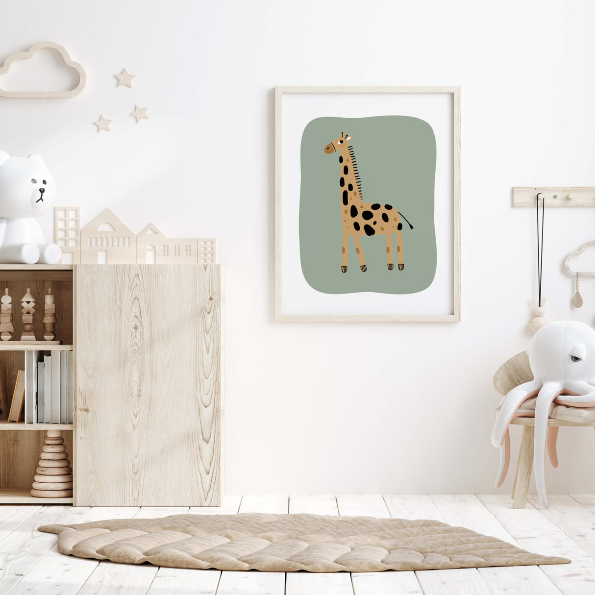 Giraffe animal print with sage green bakcground in scandinavian and minimal style for neutral nursery decor and neutral nursery ideas.