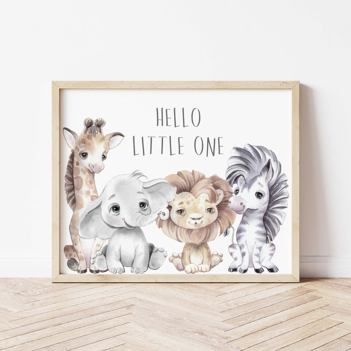 Watercolor safari animals printable with hello little one quote for gender neutral nursery decor, toddler room decor, boys room decor, girls room decor, boho nursery decor, animals: giraffe, elephant, lion, zebra.
