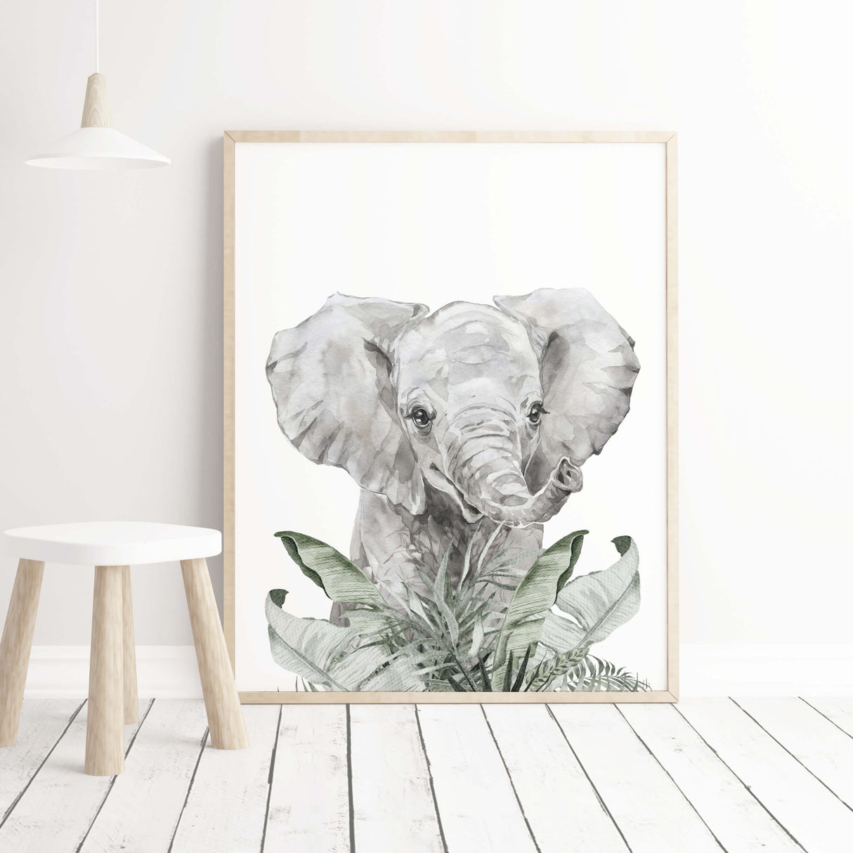 Watercolor elephant printable with leaves for neutral nursery room decor.