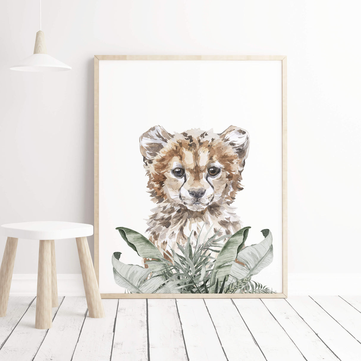 Watercolor leopard print with leaves for neutral nursery decor.