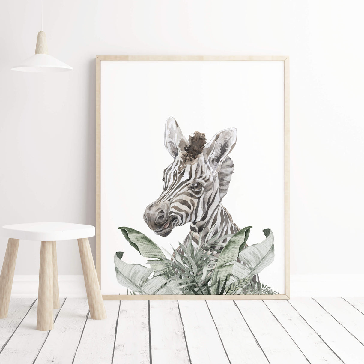 Watercolor safari print with zebra head and leaves print for neutral nursery decor.