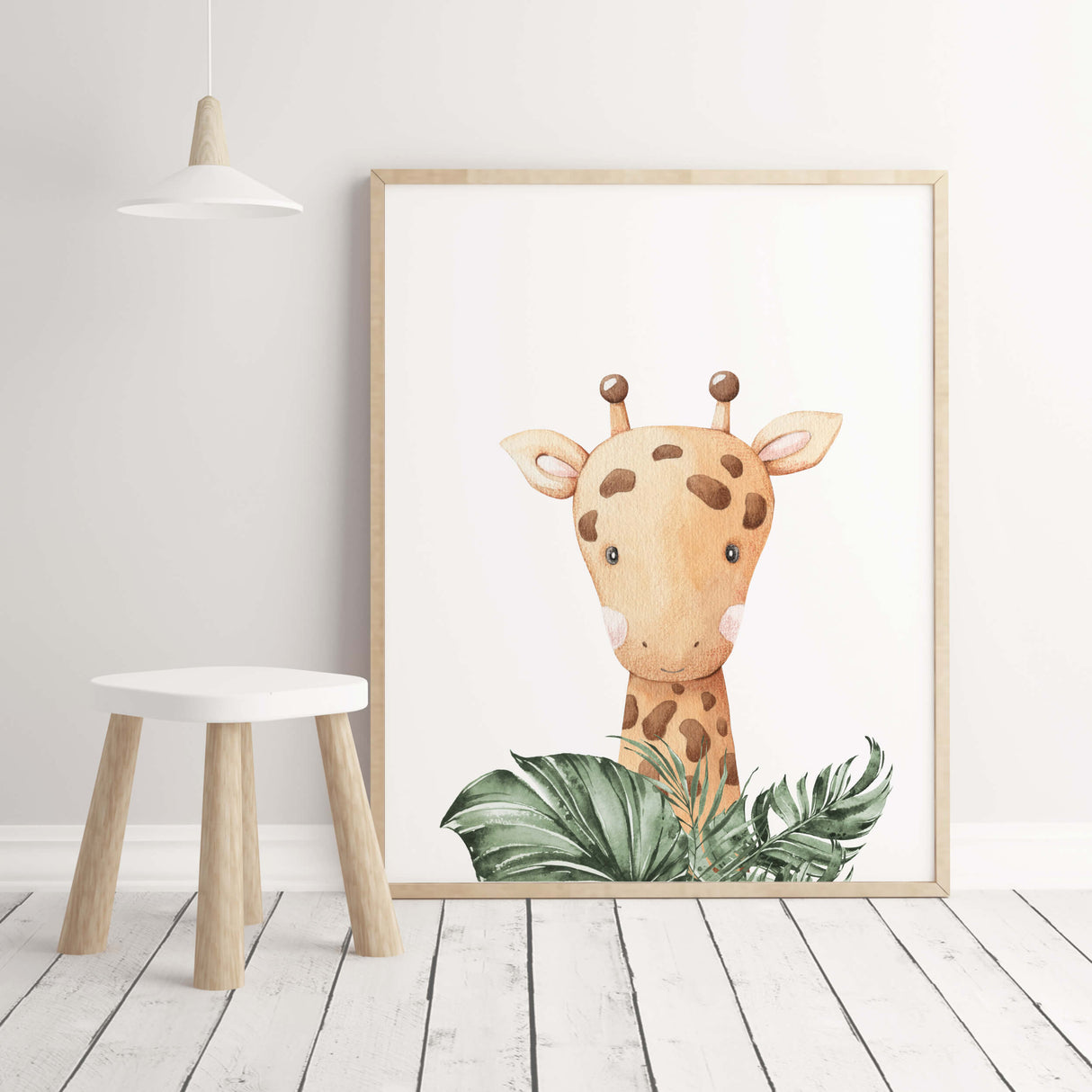 Watercolor giraffe print with leaves for neutral nursery decor.