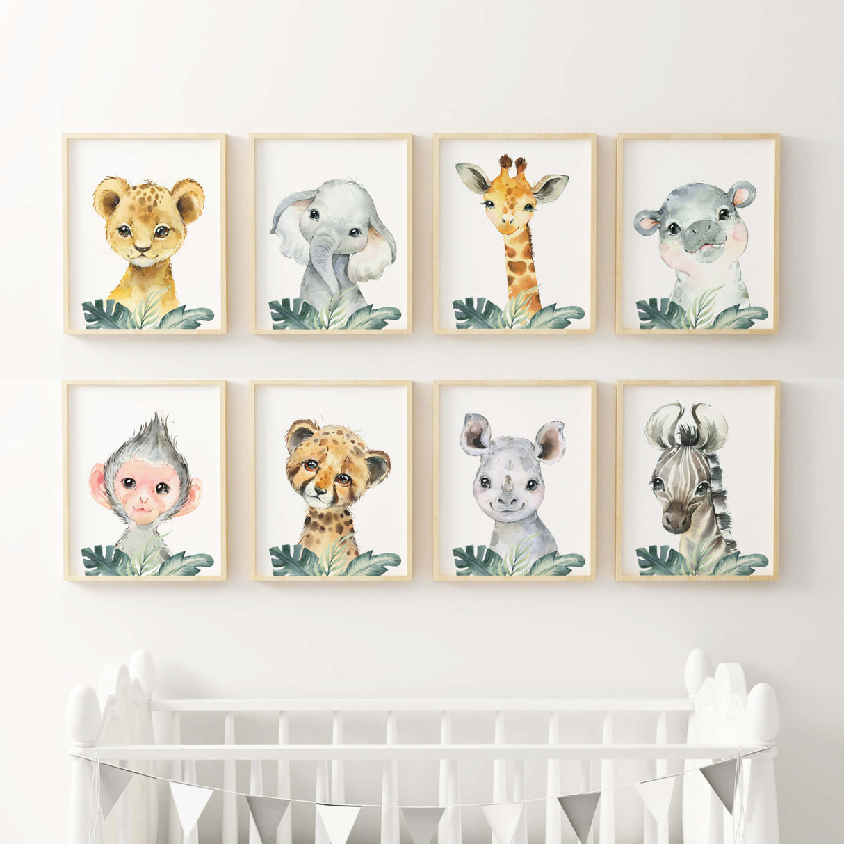 Watercolor safari animals printable with leaves for gender neutral nursery decor, baby boys room decor, girls room decor, boho room decor, animals: lion, elephant, giraffe, hippo, rhino, monkey, leopard, zebra.