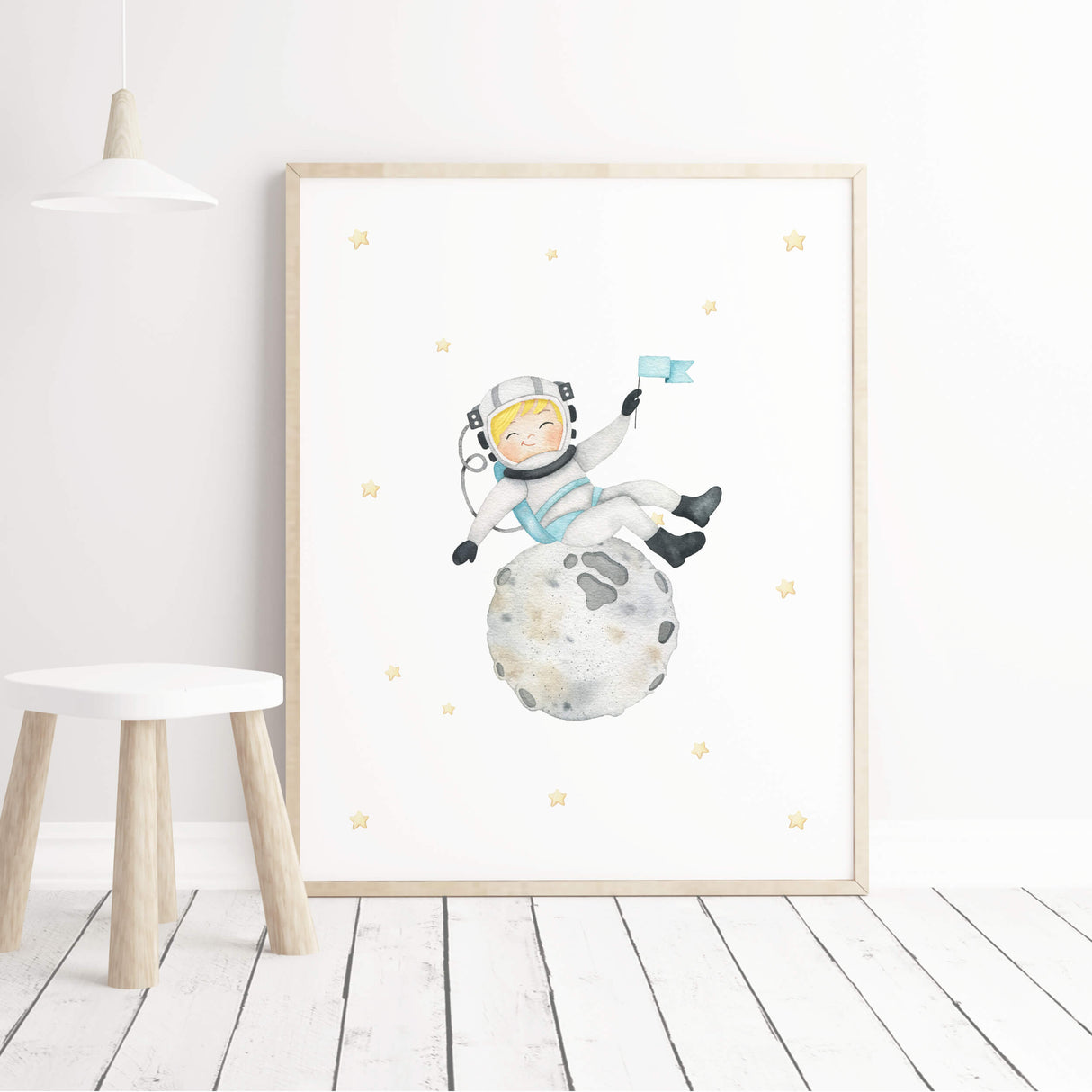 Watercolor astronaut boy with blonde hair on the moon printable for boys nursery wall decor.