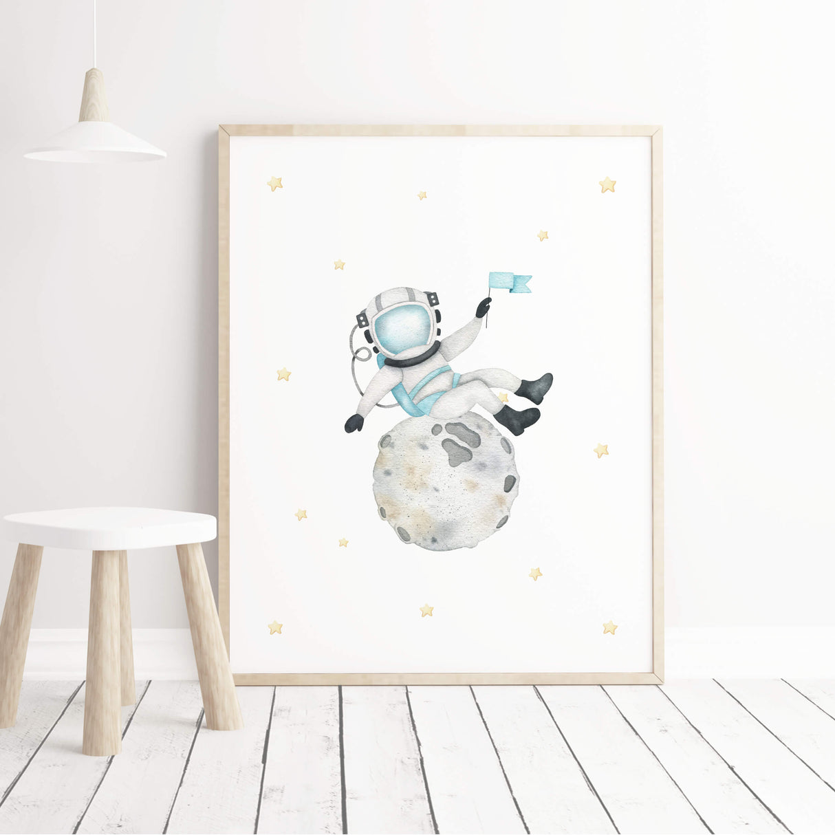 Watercolor astronaut boy on the moon printable for boys nursery wall decor.