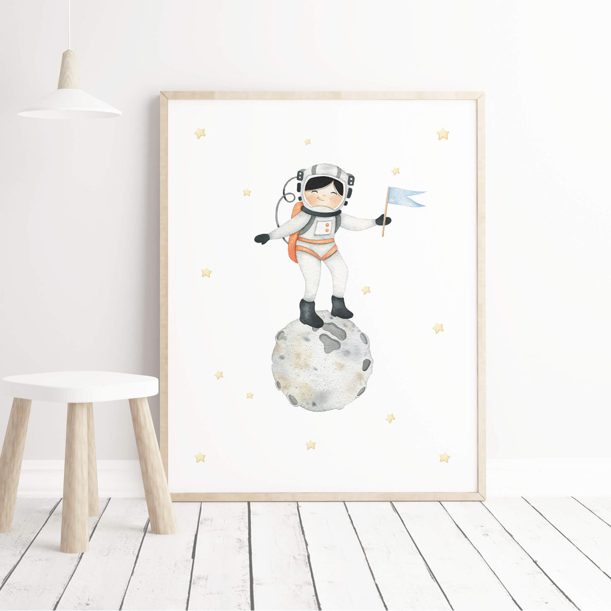 Watercolor astronaut girl with black hair on the moon printable for girls nursery wall decor.
