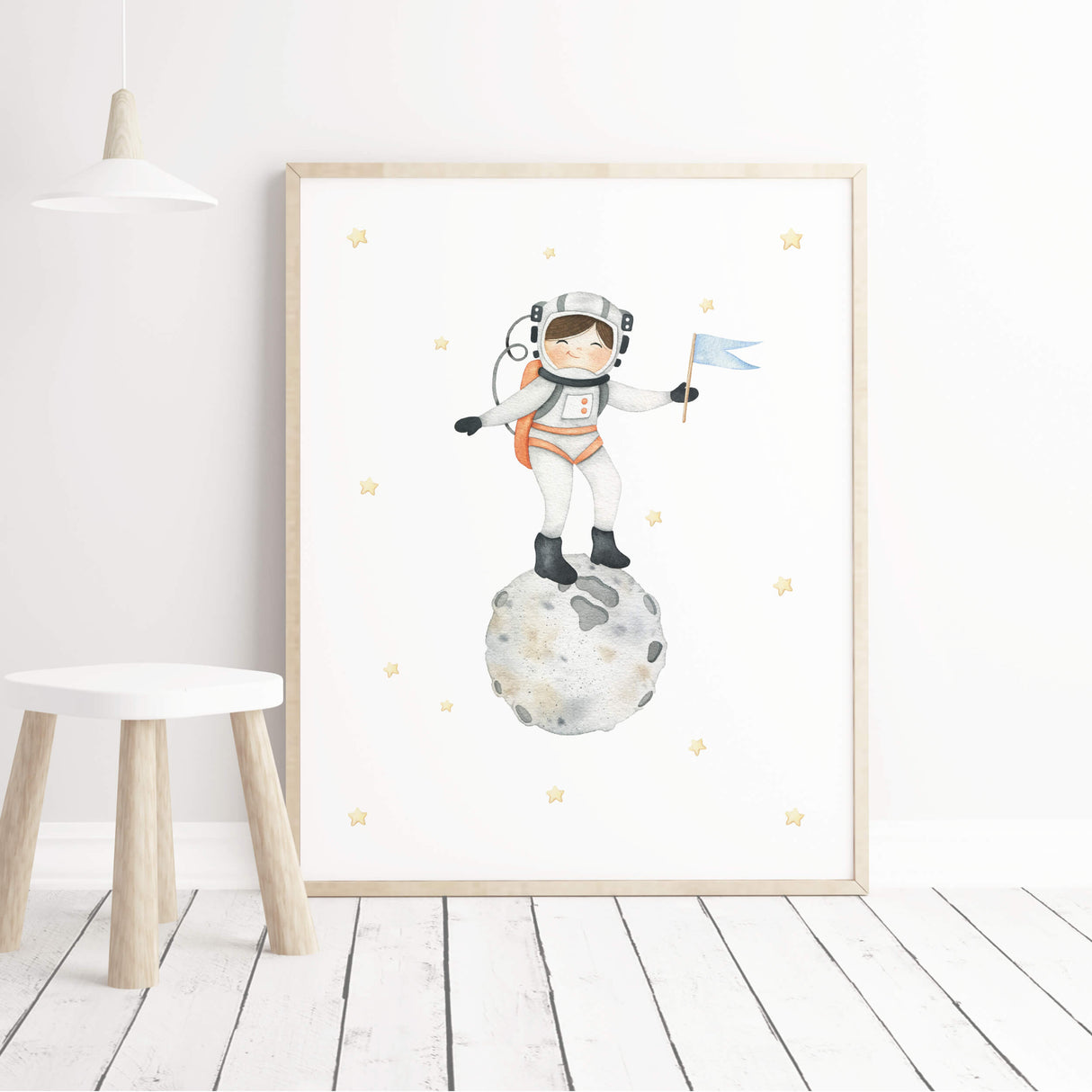 Watercolor astronaut girl with brown hair on the moon printable for girls nursery wall decor.