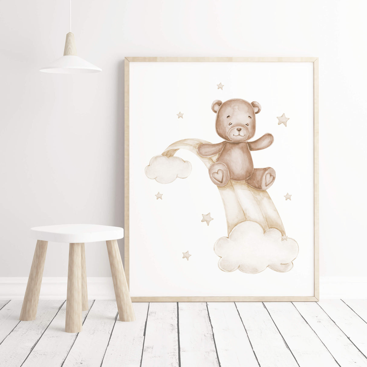 Watercolor teddy bear
on a rainbow in beige and brown colors for gender neutral nursery ideas.