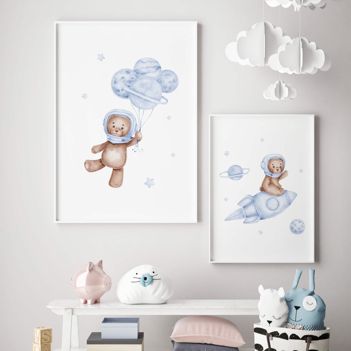 Set of 2 watercolor astronaut teddy bear in space poster with light blue and brown colors for toddler room decor and baby boys room decor.
