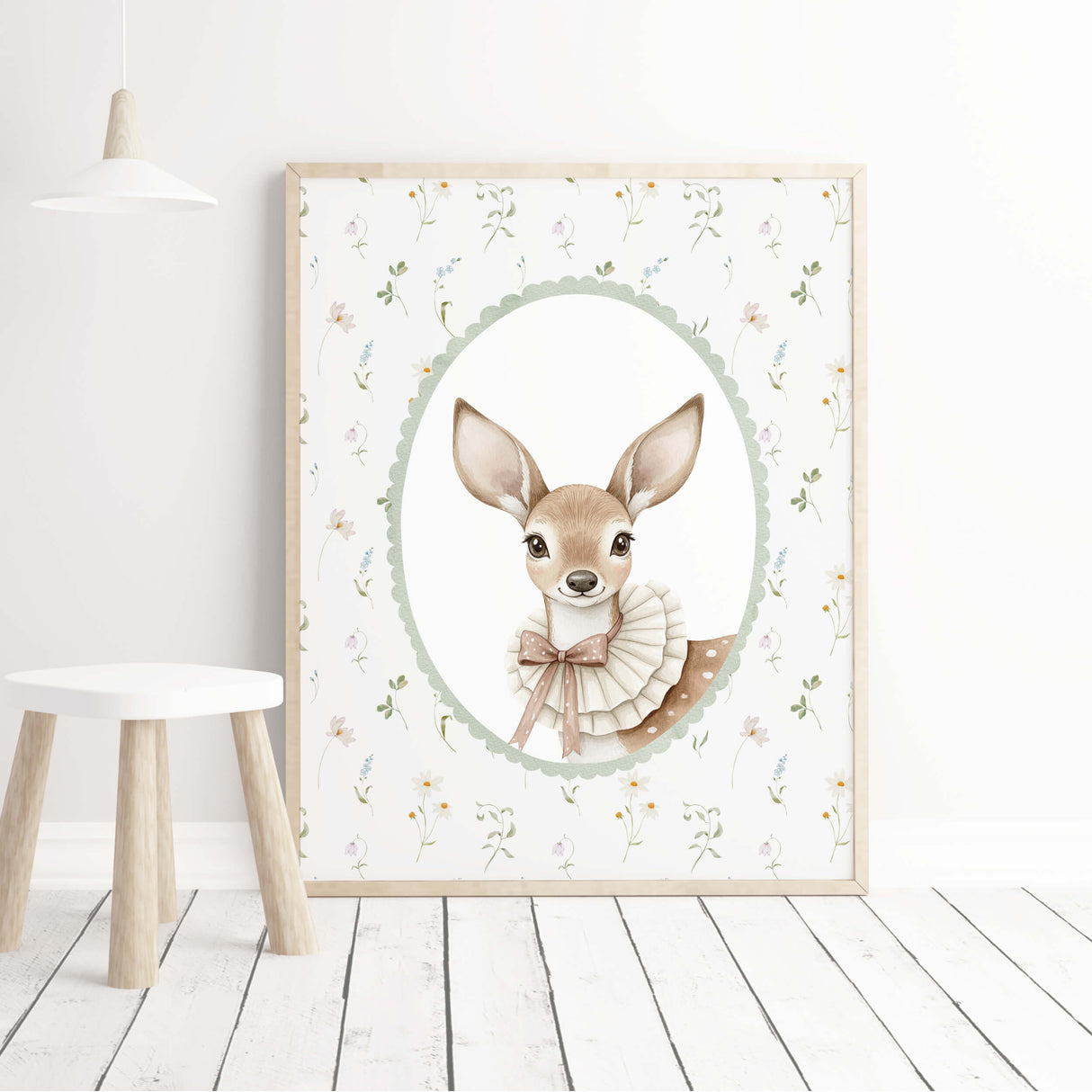 Printable deer portrait for a woodland nursery, accented with wildflowers and a soft sage green border.
