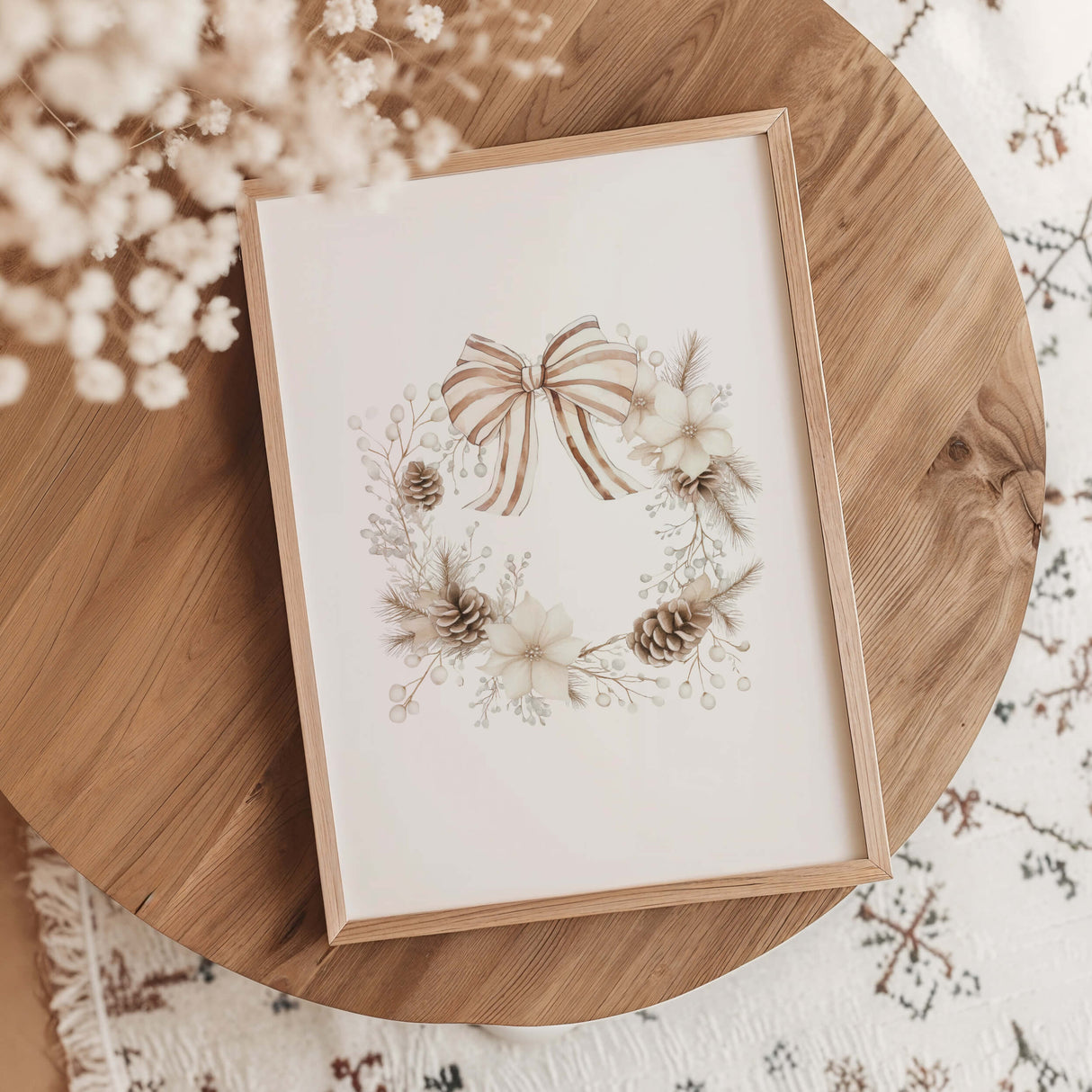 Beige Christmas wreath printable wall art with bow and pinecones.