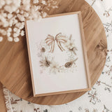 Beige Christmas wreath printable wall art with bow and pinecones.