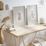 Printable baby animal art for nursery: watercolor style rabbit and goose on a checkered design.