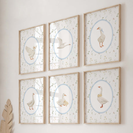 Boho nursery wall art set featuring vintage goose illustrations with wildflower backgrounds, perfect for baby room decor in neutral colors with blue accents
