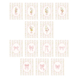 Pink vintage nursery wall decor with wildflowers and bow artwork