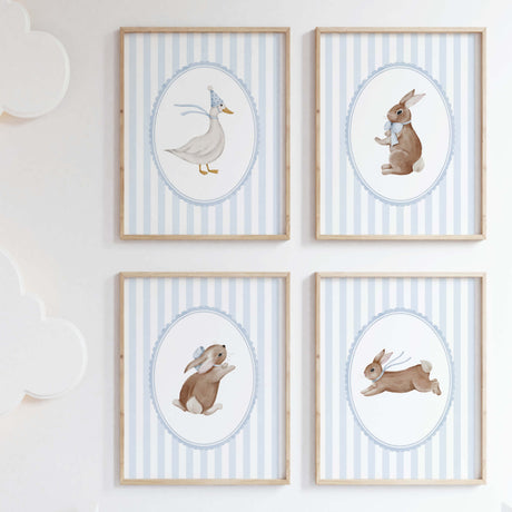 Nursery wall art with bunny and duck illustrations in pastel colors for baby boy room.

