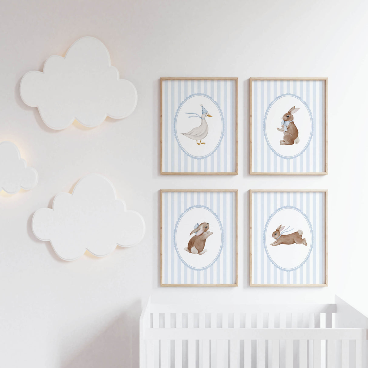 Baby nursery animal prints set with blue striped background and framed artwork.

