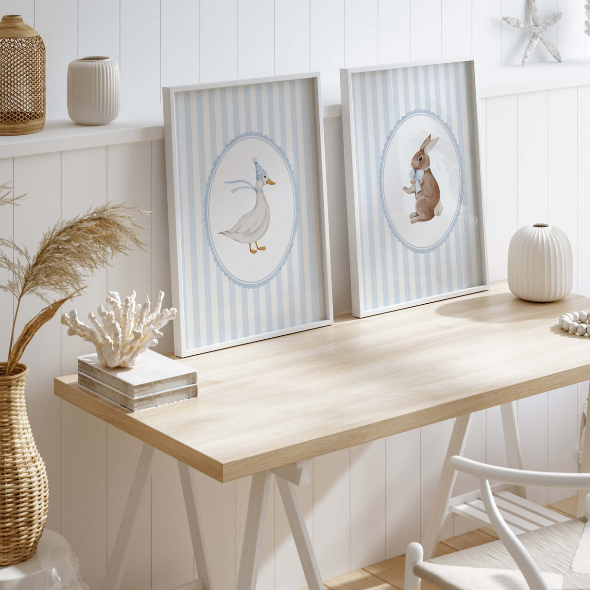Scandinavian-style nursery wall art with watercolor bunny and goose prints.

