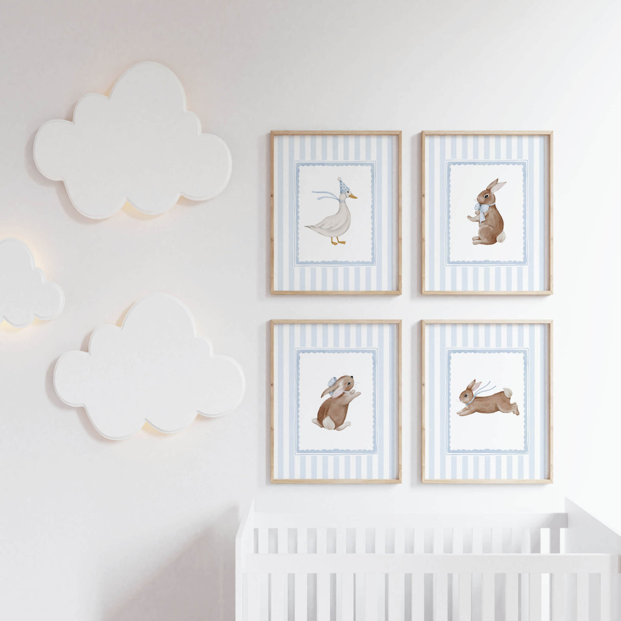 Baby nursery animal prints set with blue striped background and framed artwork.

