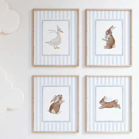 Nursery wall art with bunny and duck illustrations in pastel colors for baby boy room.


