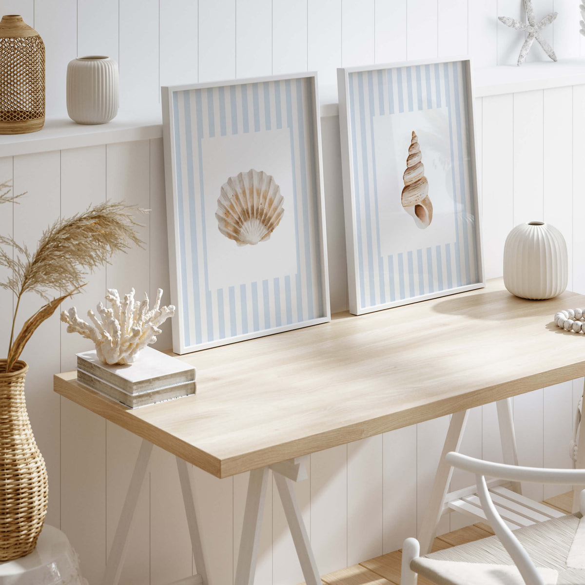 Blue seashell printable wall art set featuring watercolor shells and starfish on light blue striped backgrounds for coastal beach house decor.