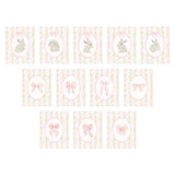Feminine nursery wall art with bunny illustrations flowers and bows