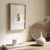 Gender-neutral nursery wall art set in soft beige with baby bunny and duck.