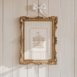 Neutral nursery wall art featuring carousel horse and fairytale animals

