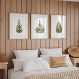 Scandinavian style Christmas printable wall art with pine tree illustrations.