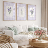 Provence lavender floral wall decor with pastel colors and vintage jugs.

