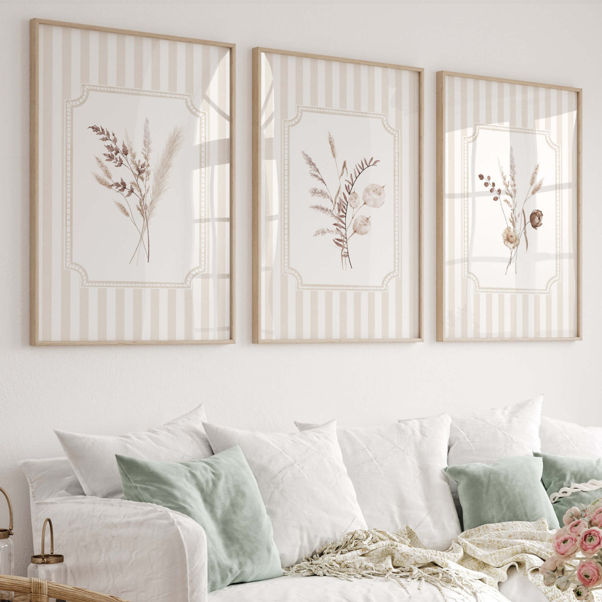 Neutral beige boho botanical wall art prints with striped background for nursery or living room.

