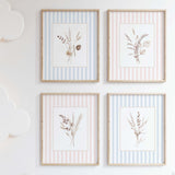 Printable wall art set of 4 with dried flowers on pink and blue striped backgrounds

